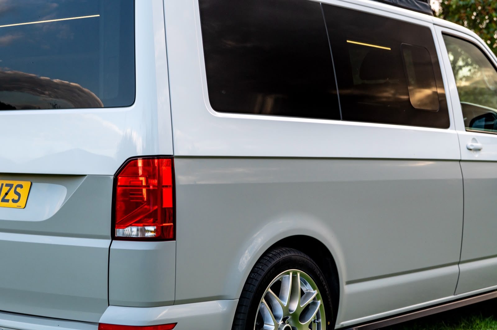 Close-up of Camper Glass privacy side windows on a VW Transporter