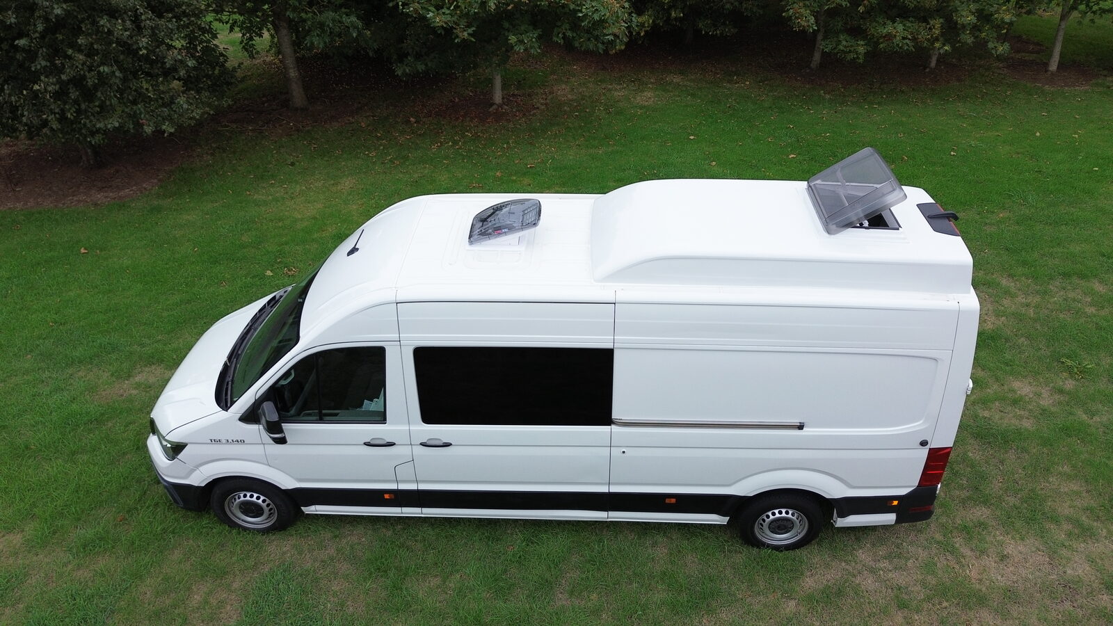 LWB van with GRP roof pod and skylight fitted