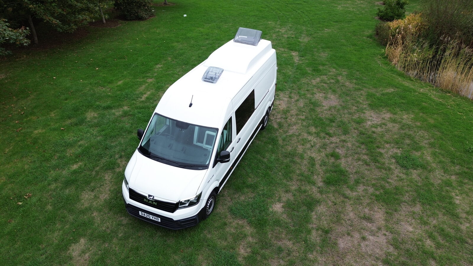 GRP roof pod on a long-wheelbase van, front three-quarter view