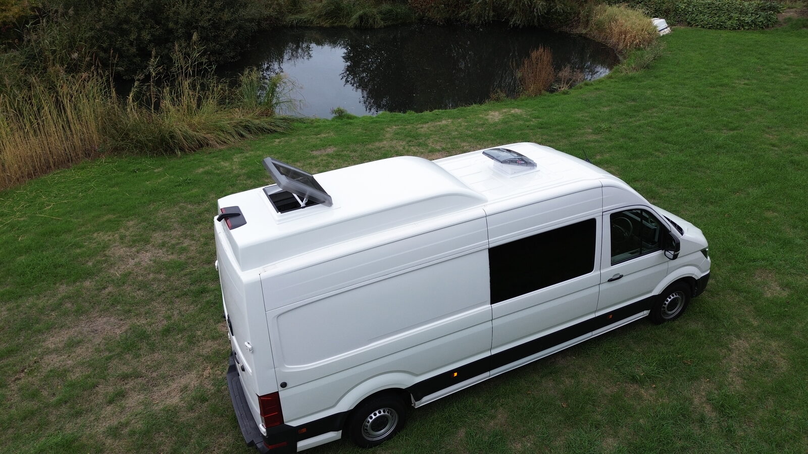 Roof pod and skylight, rear three-quarter view